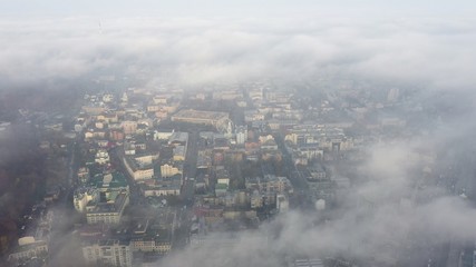 Aerial view of the city in the fog