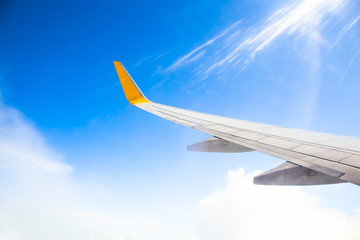 Wing of an airplane. Photo applied to tourism operators and fast and efficient transportation. picture for add text message or art work frame website. Traveling concept.