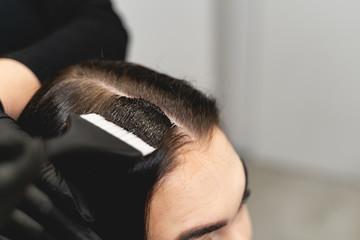 Focused photo on brush in female hands