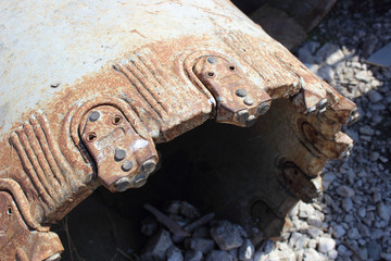 Old rusty drill head for drilling holes for foundation or constructions support or piles in the...