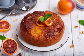 Upside down biscuit cake with caramelized bloody oranges. Delicious homemade dessert.