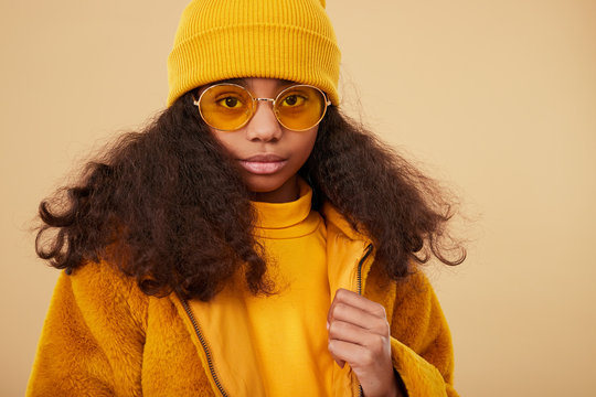 Little Hipster Girl In Warm Colorful Clothes