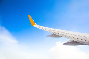 Wing of an airplane. Photo applied to tourism operators and fast and efficient transportation. picture for add text message or art work frame website. Traveling concept.
