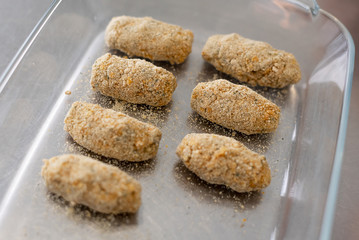 Homemade croquettes on a cristal tray