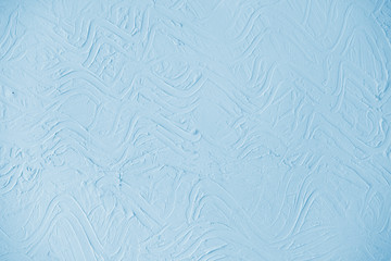 Light  blue wall background with embossed abstract pattern