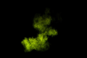 Fototapeta premium Light green powder explosion on black background. Colored powder cloud. Colorful dust explode. Paint Holi.