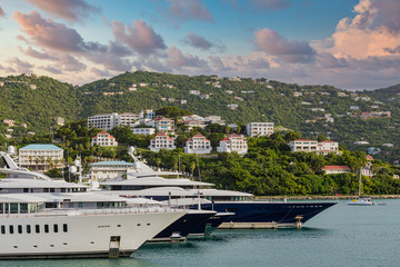 Bow of massive luxury yachts in bay on St Thomas