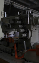 Fototapeta na wymiar sewing machine in a large sewing shop, factory