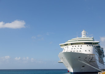 Fototapeta na wymiar Luxury Cruise Ship Anchored Under Nice Skies at Harbor on St Croix