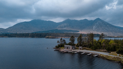 drone shot of lake and mountains of Connemara