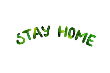 Lettering to stay home. The phrase is painted in green watercolor on a white background. Hands written quote. A call to quarantine a house. Coronavirus pandemic.