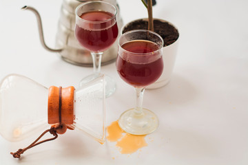 White background, wine glasses and black, strong, morning, fresh coffee in glass container for alternative method preparation.