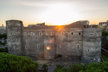 Catania, Sicily in Italy. Aerial view of the Ursino castel at dawn. Is an old medieval castle built at the time of Frederik the second of Swabia from the thirteenth century now converted in a museum