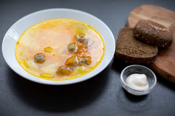 Meatball soup. Top view, copy space. Flavored, delicious soup on your table