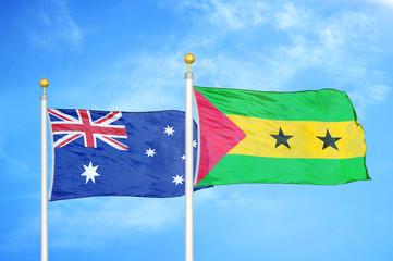 Australia and Sao Tome and Principe two flags on flagpoles and blue cloudy sky
