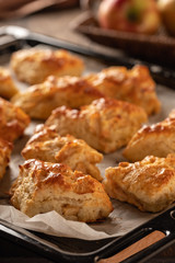 Tasty, fragrant and tender scones with apples from the oven close-up