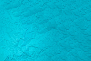 Crunched blue paper background horizontal stock photo