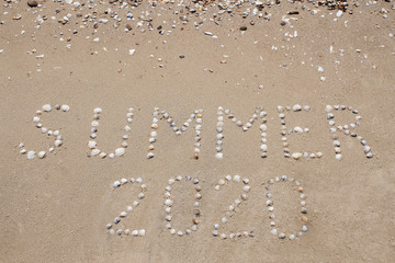 Ocean coast, beach. The inscription 