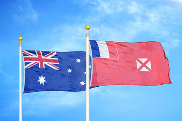 Australia and Wallis and Futuna two flags on flagpoles and blue cloudy sky