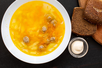 Meatball soup. Top view, copy space. Flavored, delicious soup on your table