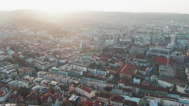 Aerial Cityscape shot of the Skyline of Stuttgart, Germany while sunset