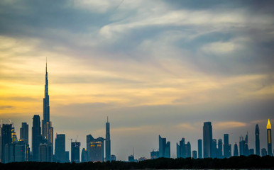 Unique view of Dubai city from Las Al Khor Wildlife Sanctuary. during sunset, golden hour, busrj khalifa,
