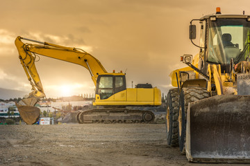 Excavator on the road construction works. Machinery needed for construction