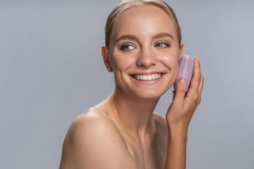 Joyful young female person doing morning routine