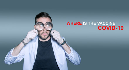 doctor in a white coat with a magnifying glass. Concept-search for medicines, vaccines, and...