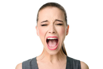 Young woman screaming loudly. Isolated on white