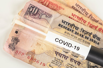 concept of crisis in India caused by virus, test  on banknote