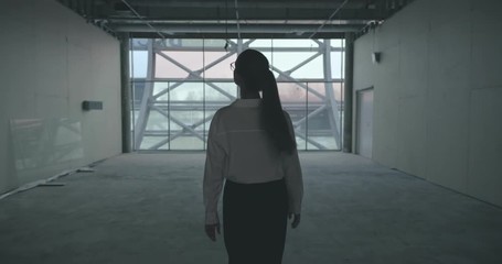 Young attractive businesswoman looking for place to rent