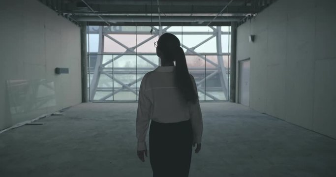 Young attractive businesswoman looking for place to rent