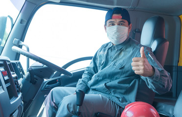 Professional truck drivers wear protective masks. Transportation that drives for a long time