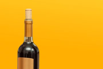 Rolgordijnen Bottle of wine with opened bung on the solid yellow background. Copy space image. © Федор Целуйко