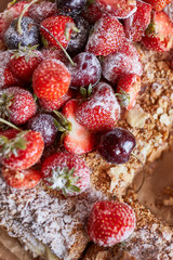 Napoleon cake with pastry cream and fresh berries