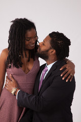 Thoughtful romantic Black couple standing together