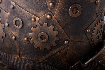 Rusty metal sheet wall with three borders of metal spikes, with orange and brown scratches and...