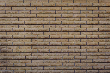 Yellow brick wall. Brick wall background.