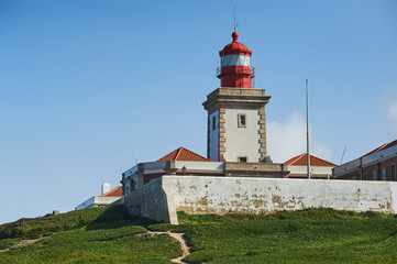 Fototapeta na wymiar Lighthouse. Portugal. West Atlantic coast of Algarve region. Portugal landscape.