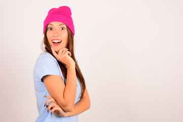 Obraz na płótnie Canvas woman in pink hat emotions smile portrait advertisement