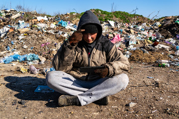 Homeless woman lives in a landfill