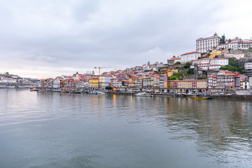 Fototapeta premium Porto, Portugal : 12 April 2016 : Old town of Porto and river Douro at sunset, Portugal.
