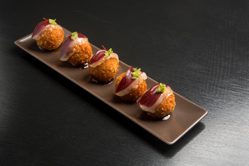 Croquette plate with Iberian ham.