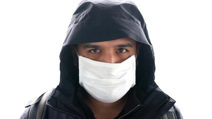 Pandemic N1H1 coronavirus protection. Young tourist man wearing protective mask on traffic street background. Concept of health and safety life, N1H1 coronavirus, virus protection. Cinematic - Powered by Adobe