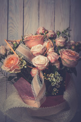 Spring bouquet of mixed flowers. Roses in a brides flower bouquet.