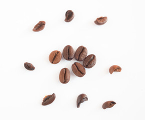 Close up organic Coffee beans isolated on white background.