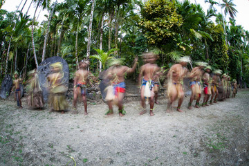 A group of young dancers perform a traditional dance in a village in Yap, Federated States of...