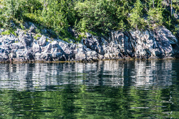 Typical scandinavian rocks and green water