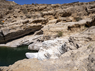Fototapeta na wymiar Beautiful rock scenery from Wadi Bani Khalid, Oman